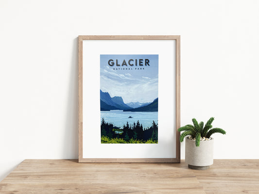 Image of a framed travel poster for Montana’s Glacier National Park. Background image of poster is a painting of Wild Goose Island and St. Mary Lake.