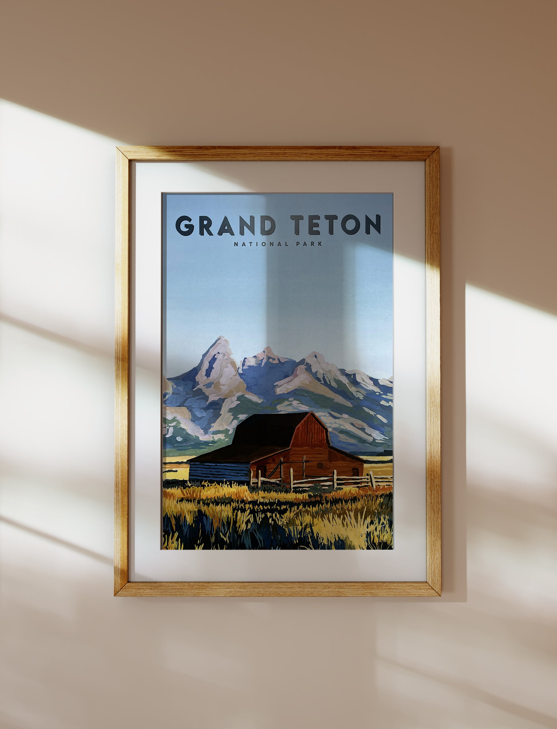 Framed Travel Poster of Grand Teton National Park. Background image of travel poster features landscape painting of T.A. Moulton Barn